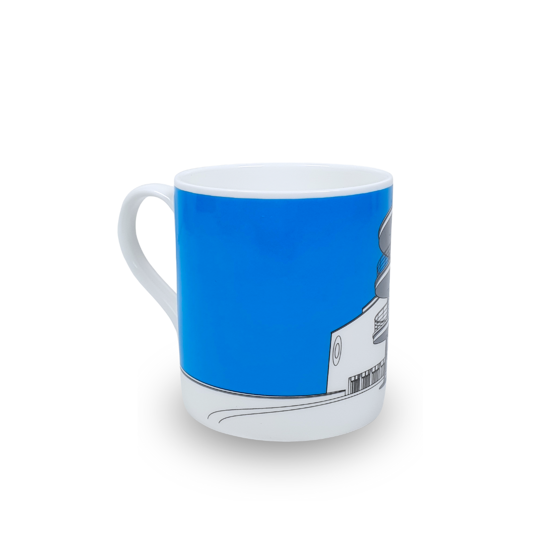 White mug with grey illustration of De La Warr Pavilion with a blue background