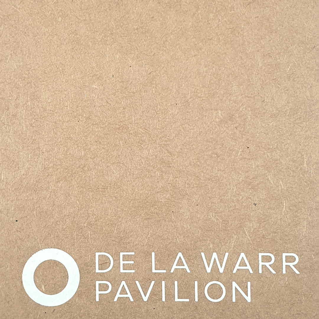 Close up of front of Brown A5 De La Warr Pavilion branded notebook