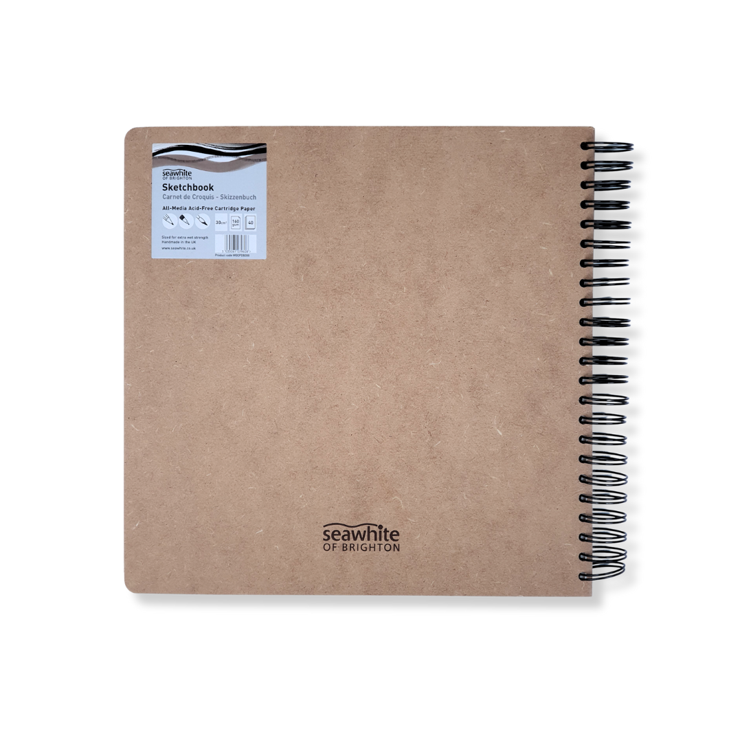 back view of DLWP square sketchbook, brown cover with large black DLWP roundel