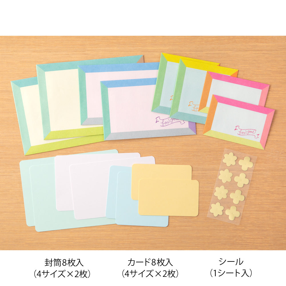 Set of pastel writing papers and envelopes in various sizes