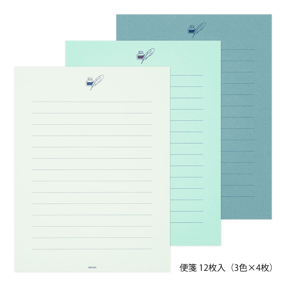 Three sheets of writing paper in different shades of blue