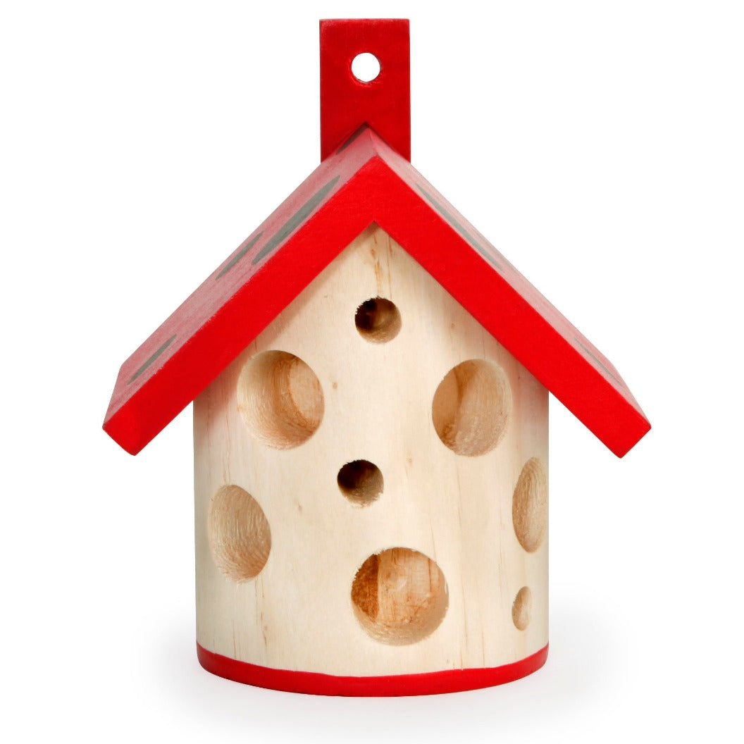 Pinewood ladybird house with a red spotty roof