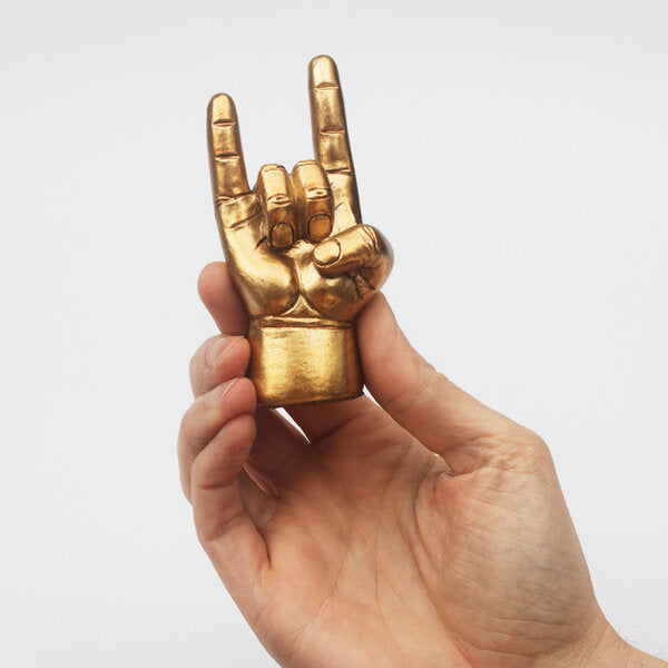 Mini gold coloured statue of hand making devil horns rock sign with box