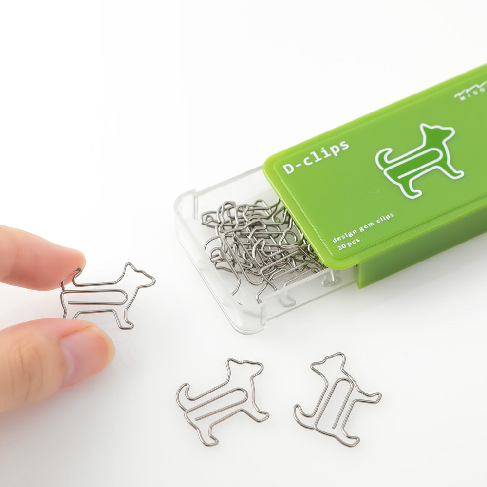 Dog shaped paper clips in slide-open lime green box.