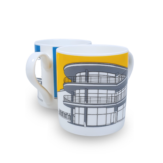 two white mugs with grey illustration of De La Warr Pavilion one with a yellow background, one with a blue background