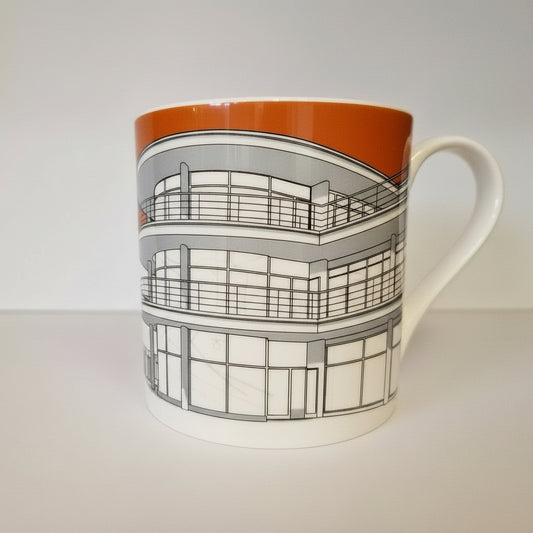 Mug with architectural design on a plain background