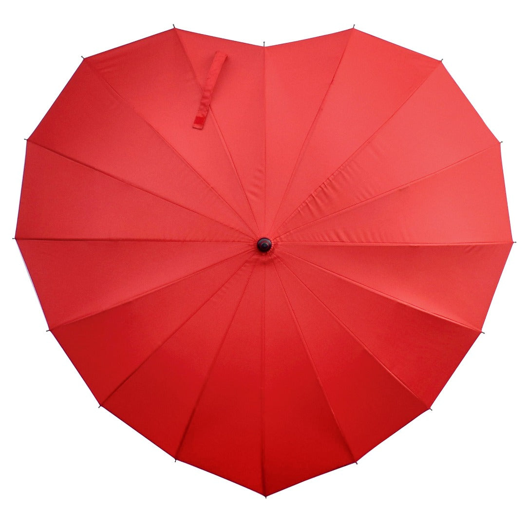 red heart shaped umbrella as seen from above