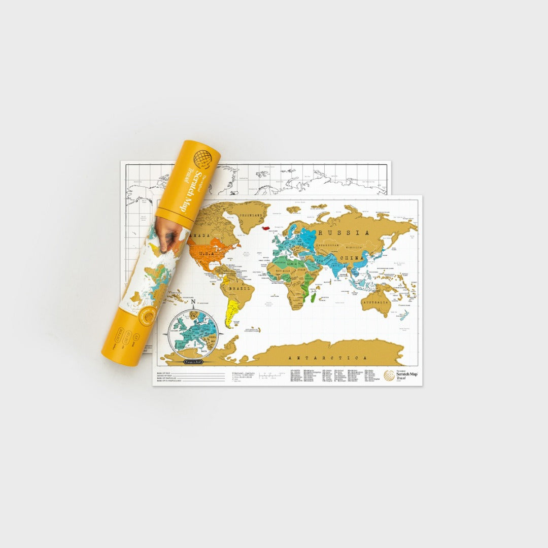 World map - some countries are gold foil, others have been scratched off to reveal colour. Also pictured is yellow cardboard tube.